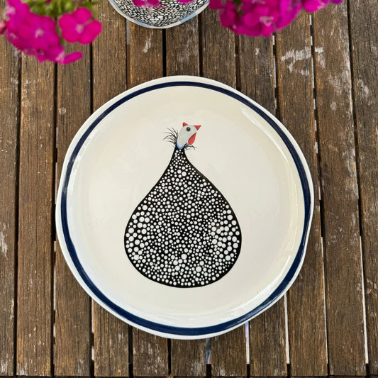 Guinea Fowl Navy Rim Dinner Plate